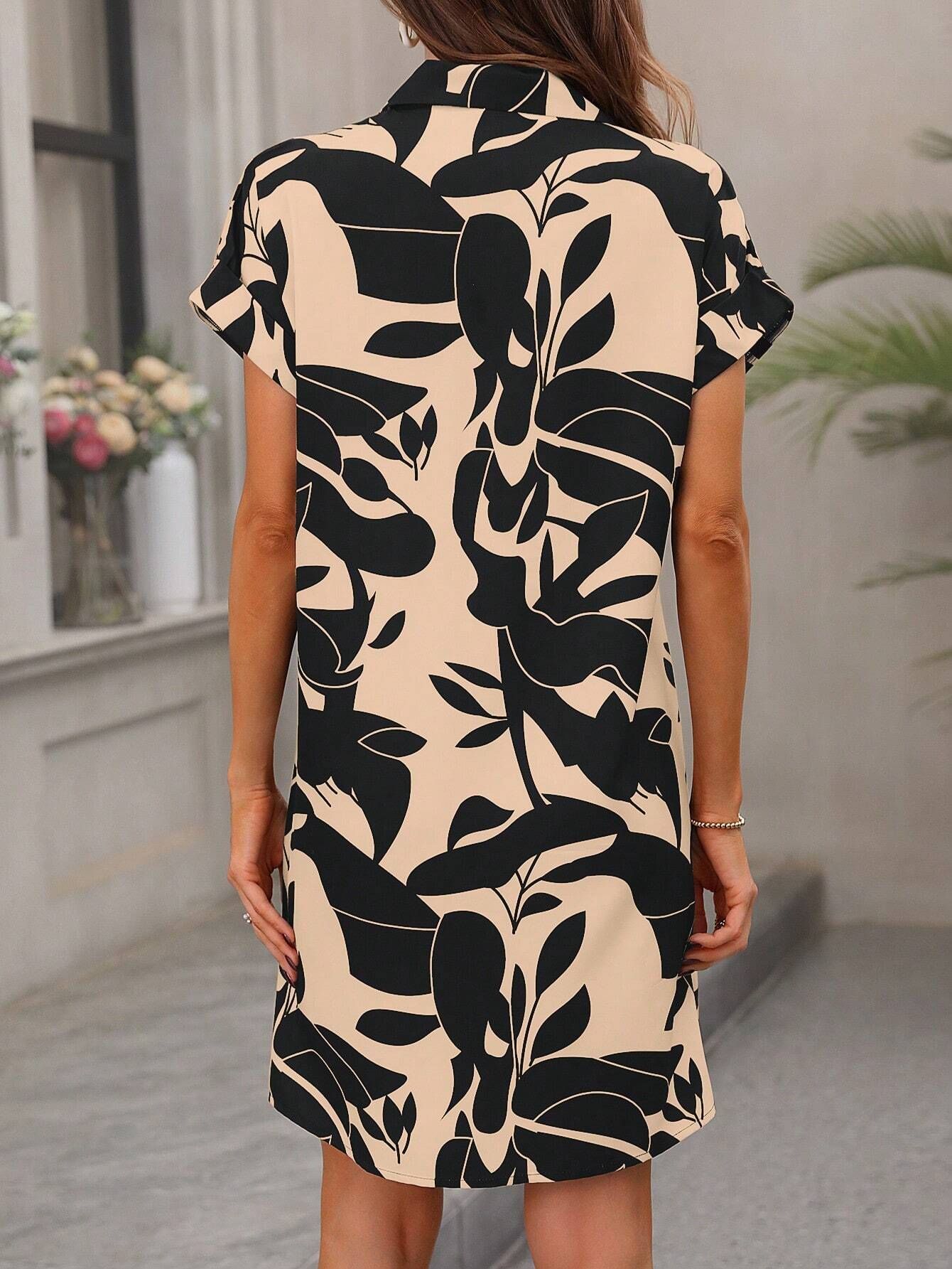 Women's tropical print dress raglan sleeve detail close-up