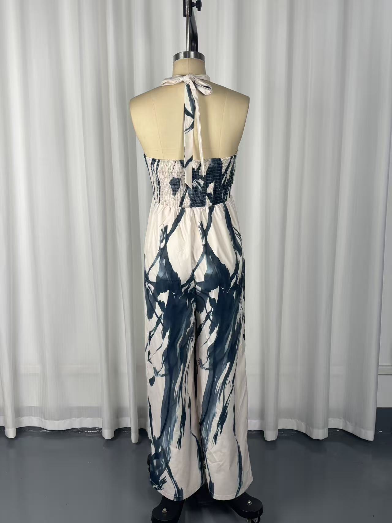 Women's apricot resort jumpsuit – ink print halter neck wide leg pocket full length