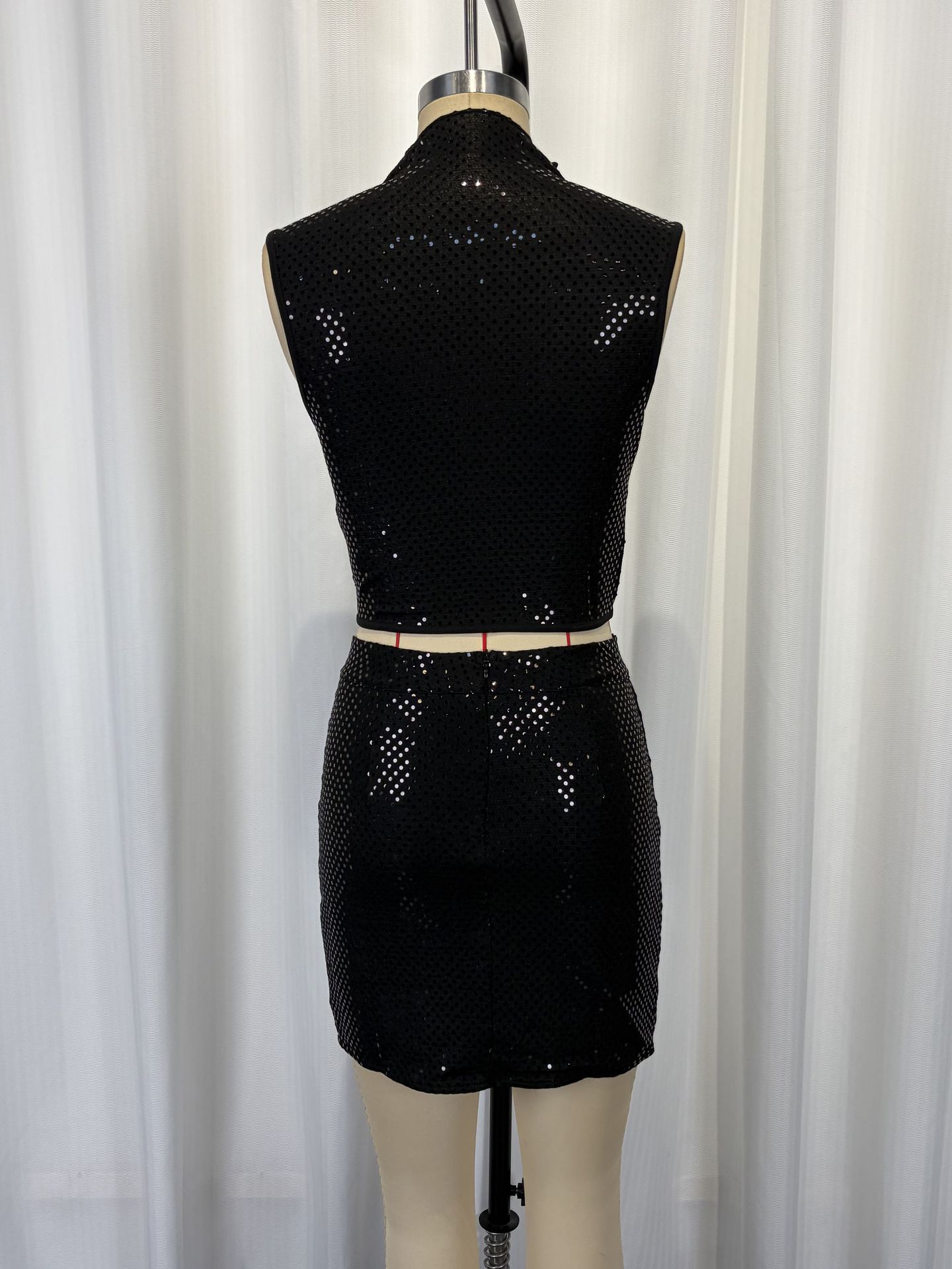 Black sequin co-ord set back view – glam two-piece vest and shorts
