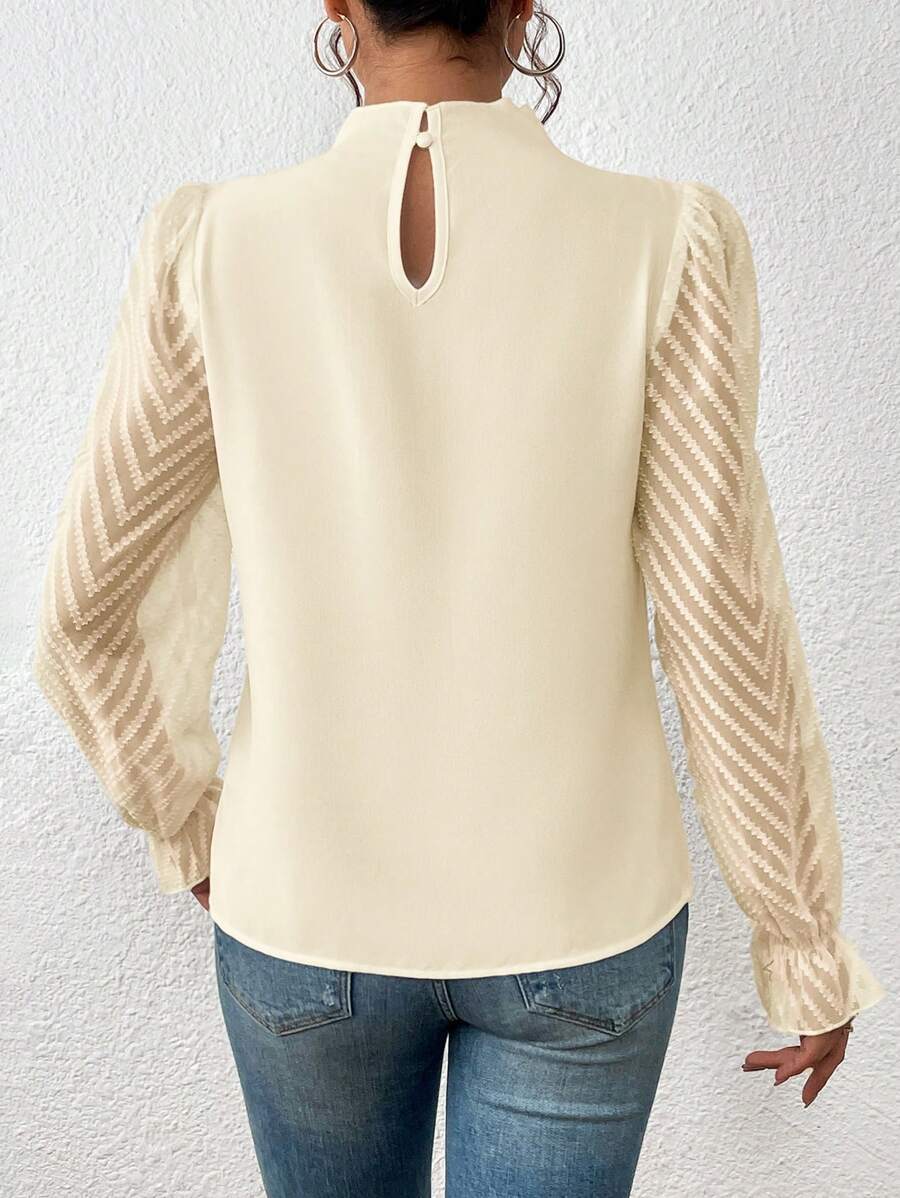 Women's black chiffon blouse wave sleeve detail view