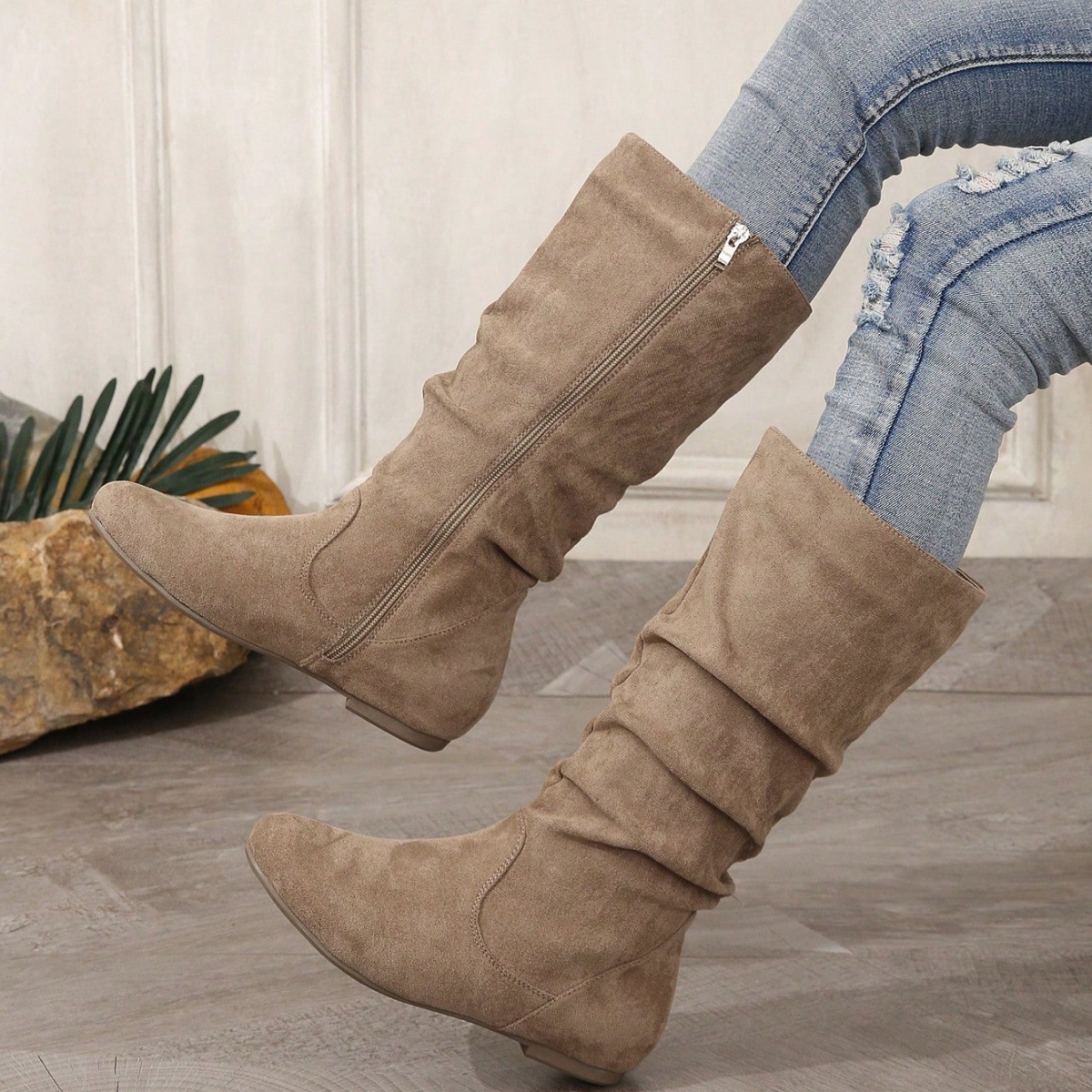 Women's mid-calf boots – lifestyle editorial shot