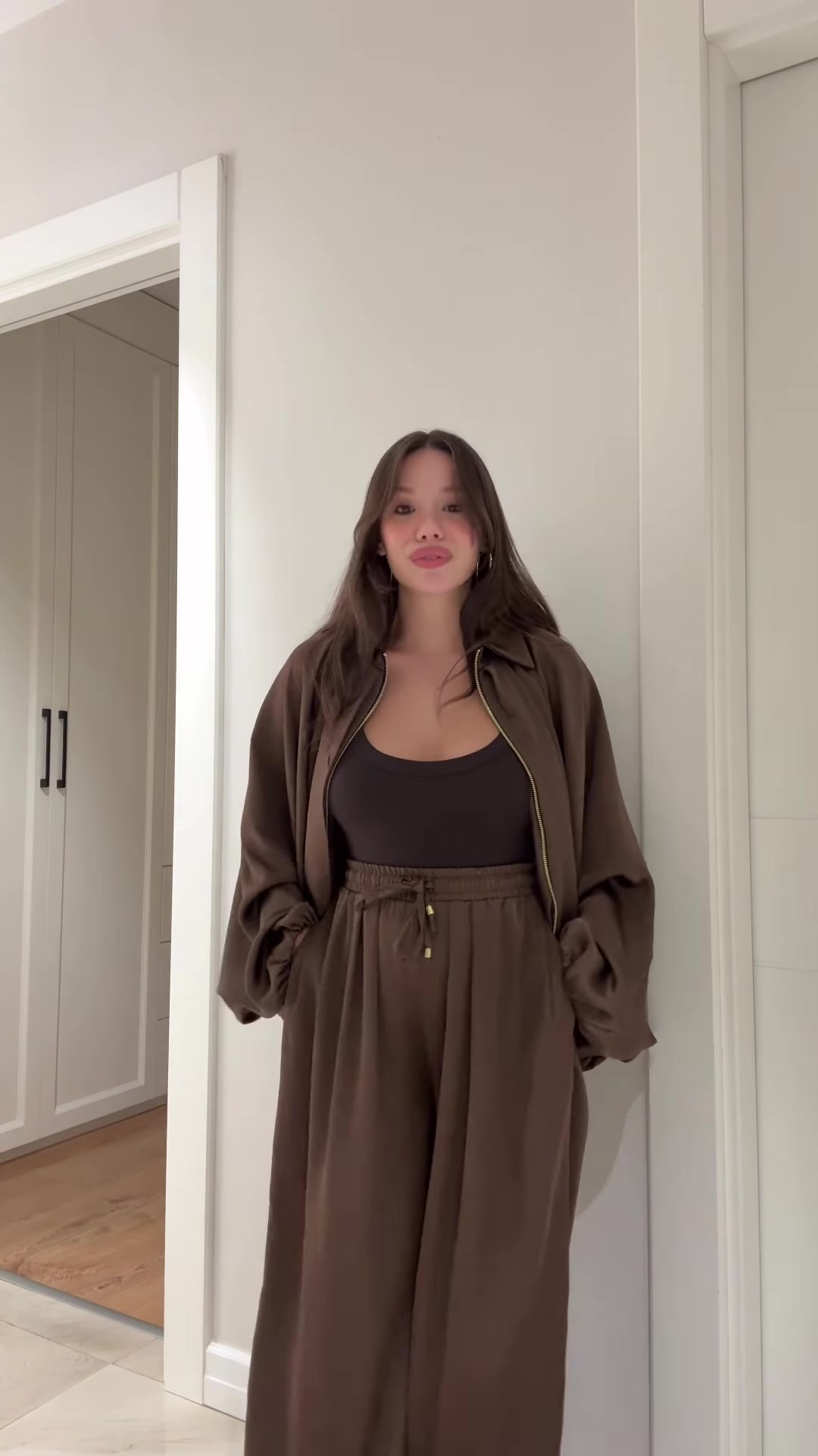 Flip collar two-piece set in brown – editorial lifestyle photo