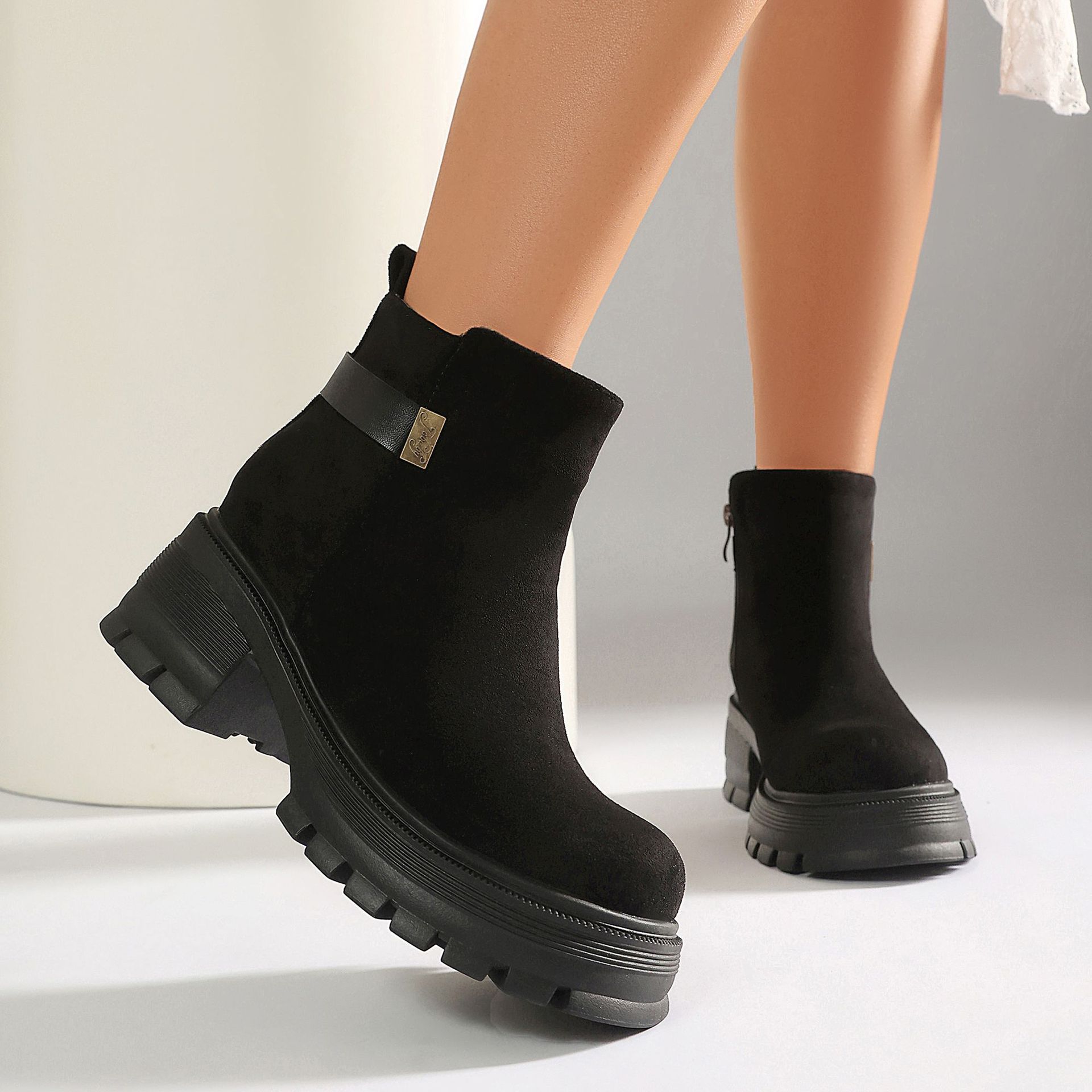 Women's chunky platform ankle boots in both colorways – black faux suede and black PU side by side