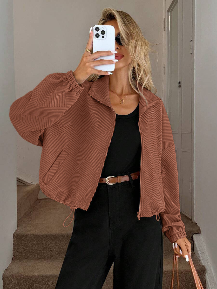 Army green women's jacket – back view showing oversized silhouette and drawstring hem