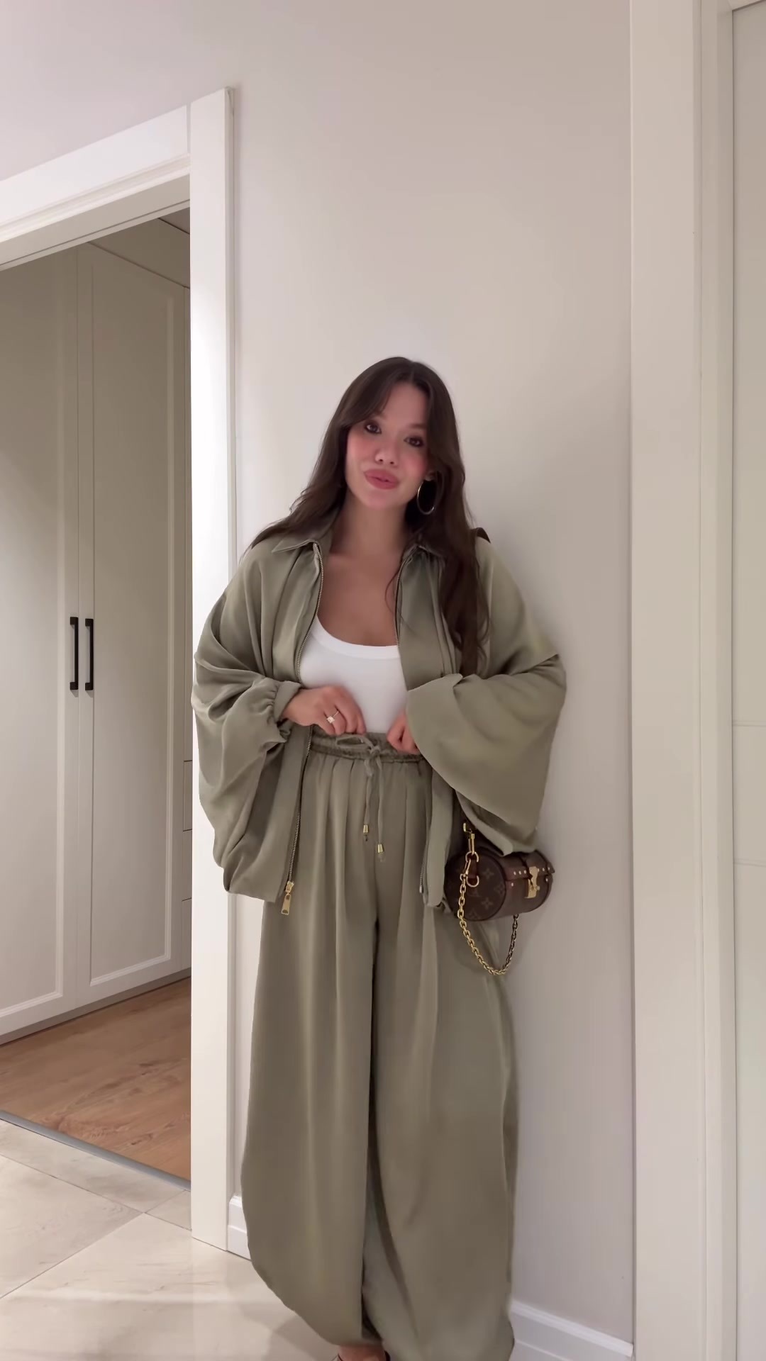 Flip collar jacket and pants set in brown – model wearing full coordinated two-piece outfit