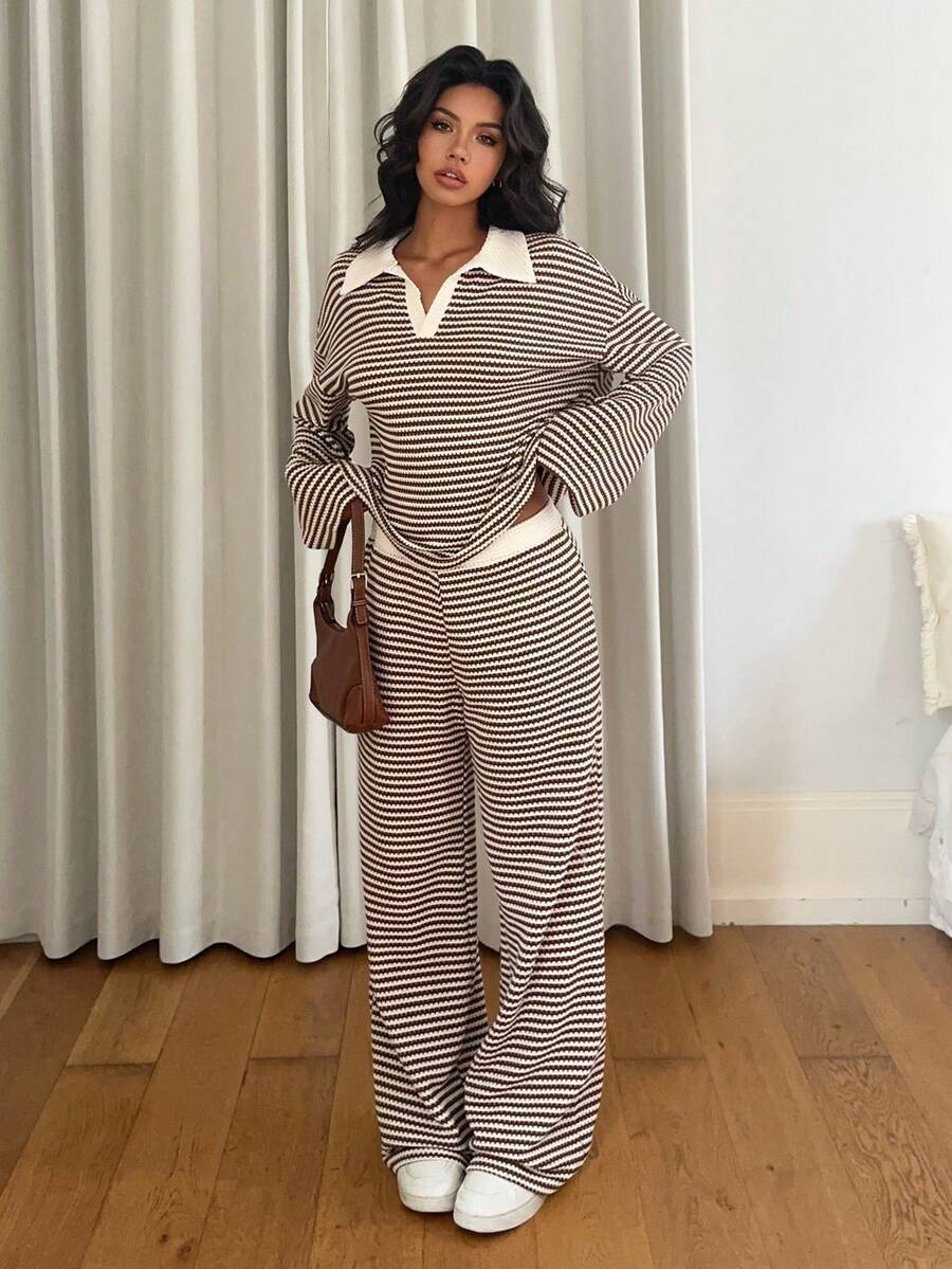 Women wearing striped two-piece set styled with sneakers and bag