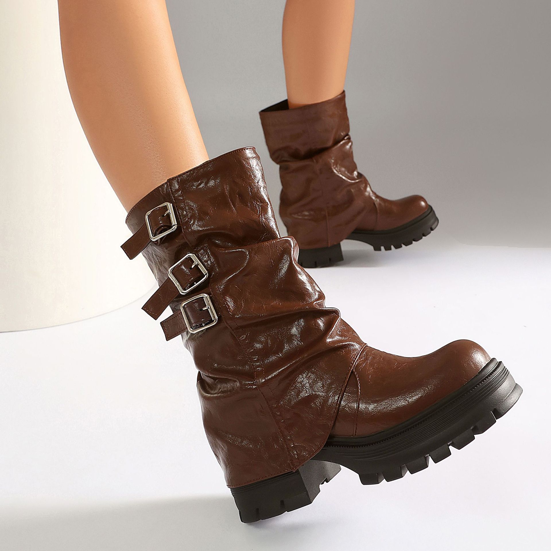 Black crinkled PU boots – front view on model showing full boot and outfit styling