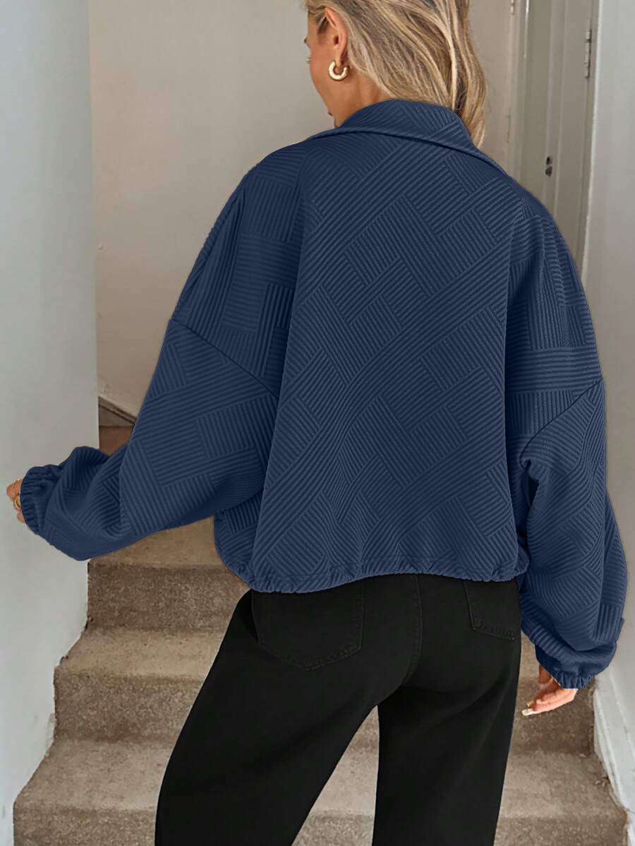 Khaki oversized jacket – side view showing loose fit and full-length zipper