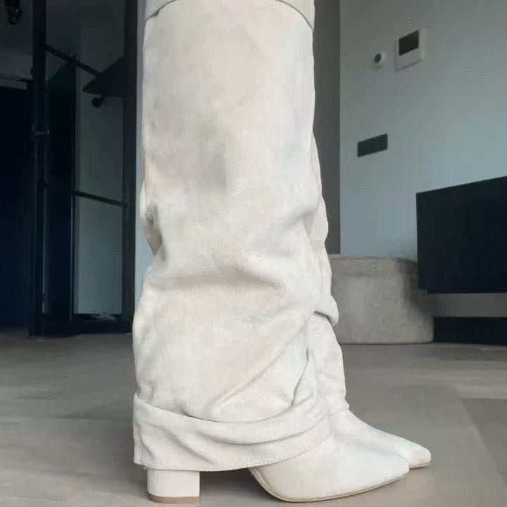 Black slouchy mid-calf boots – side view showing chunky block heel and pleated shaft drape