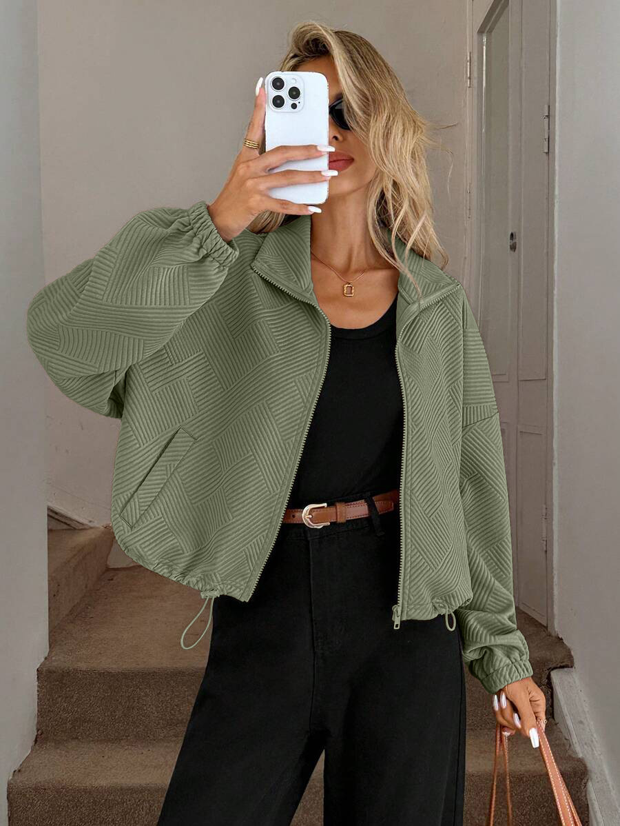 Army green high neck jacket – lifestyle shot styled with matching bottoms