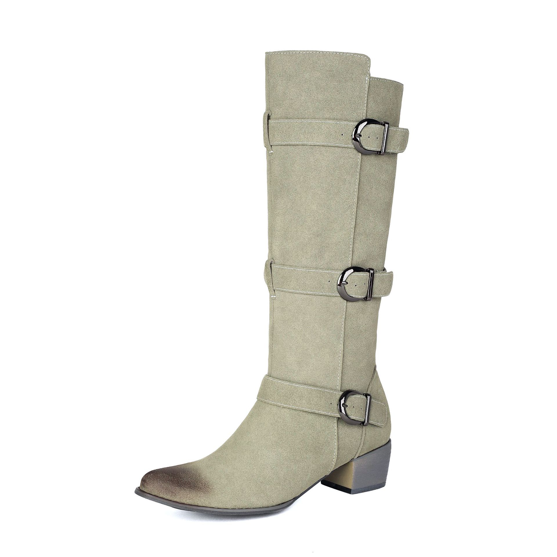 Women styling over-the-knee chunky heel boots with mini skirt – fashion editorial