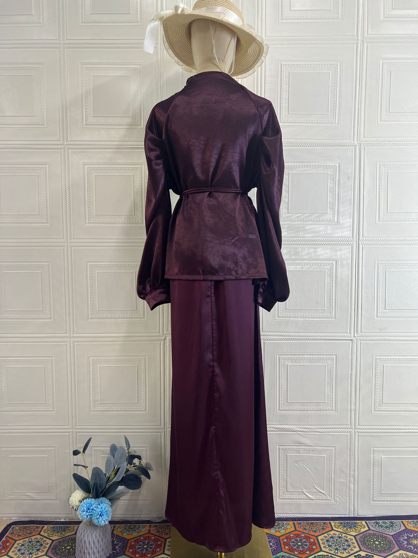 Women's V-neck peplum top with maxi skirt — belted waist detail