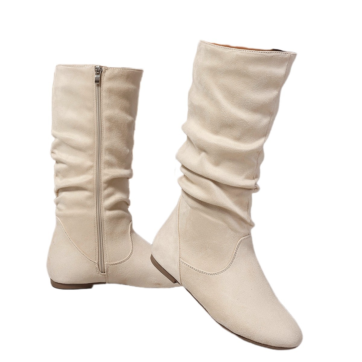 Women's mid-calf boots worn outdoors – casual street style