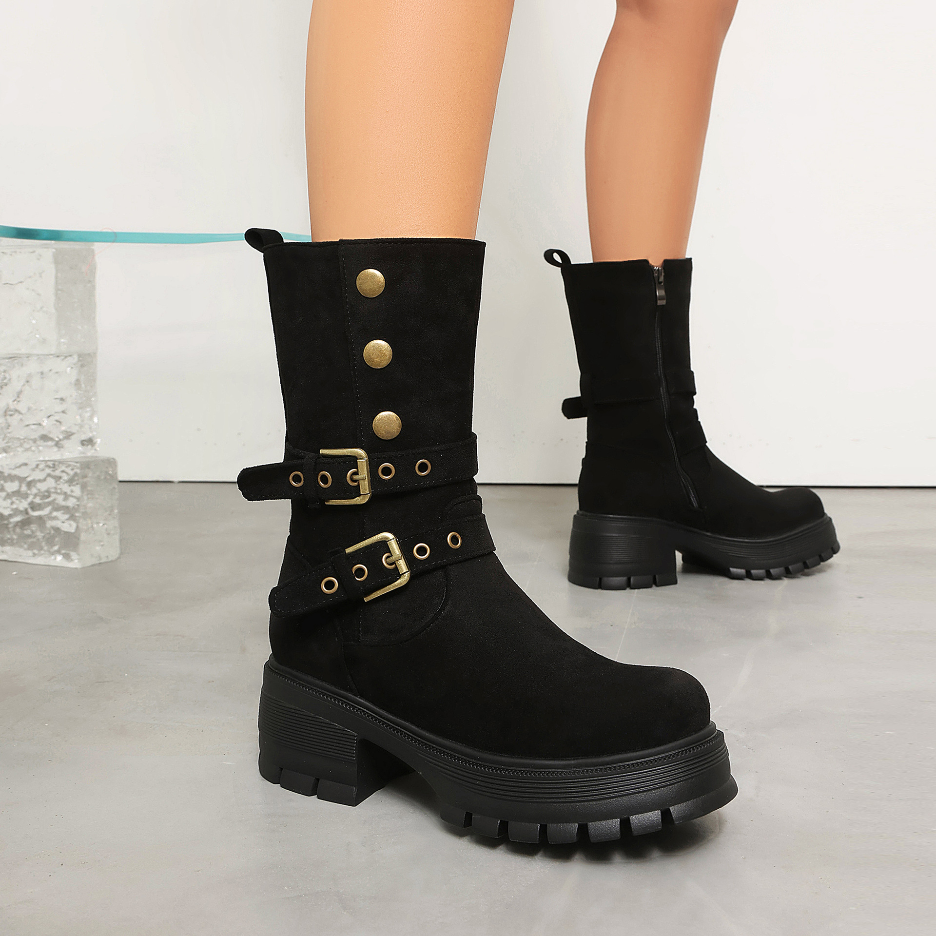 Size reference – women's punk moto boots on model showing mid-calf shaft height and fit