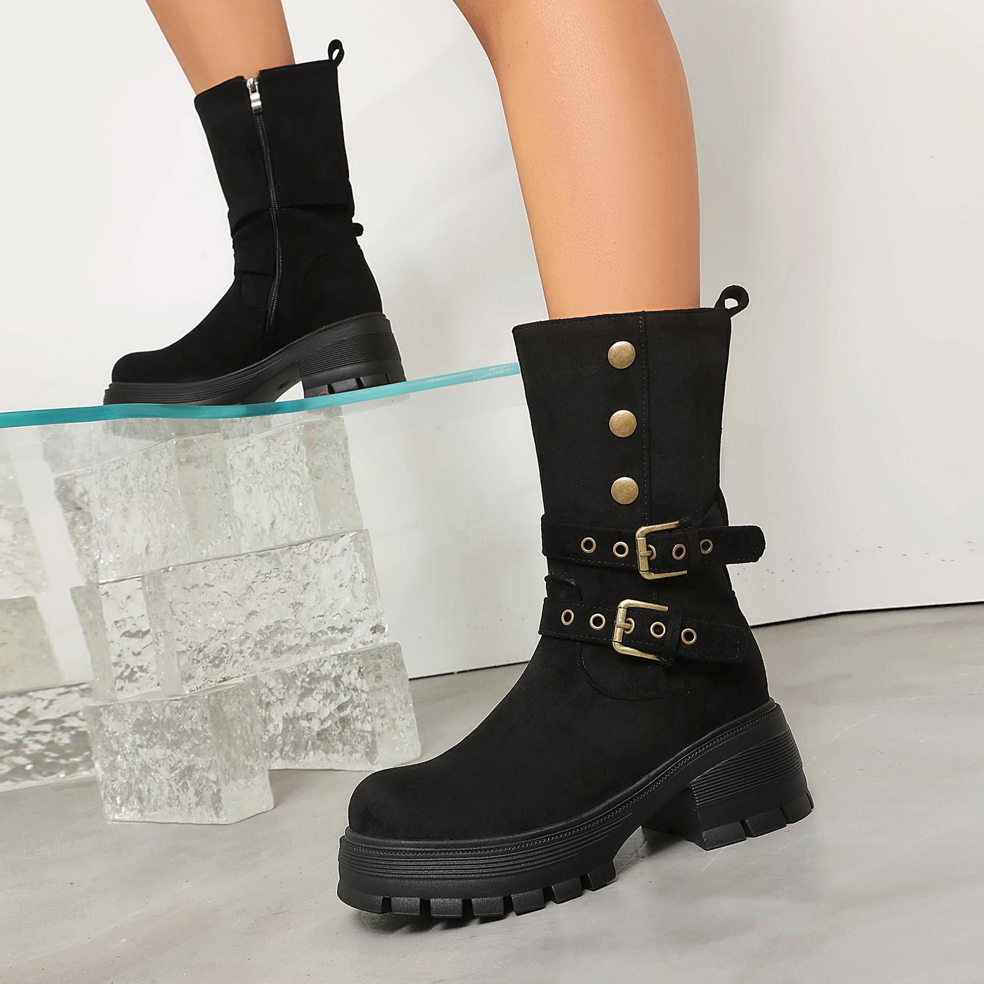 Black PU punk moto boots – lifestyle shot styled with outfit showing full boot silhouette