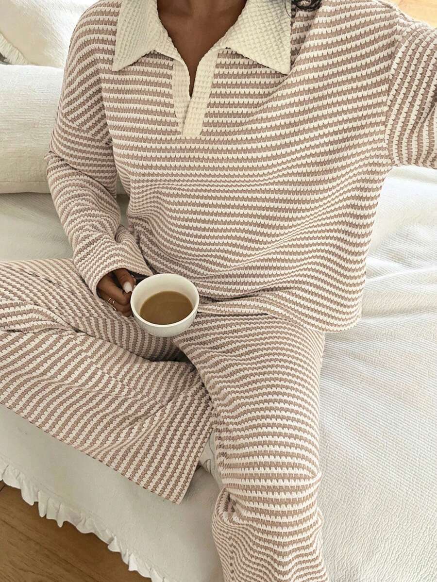 Striped two-piece set styled casually with sneakers – full outfit inspiration