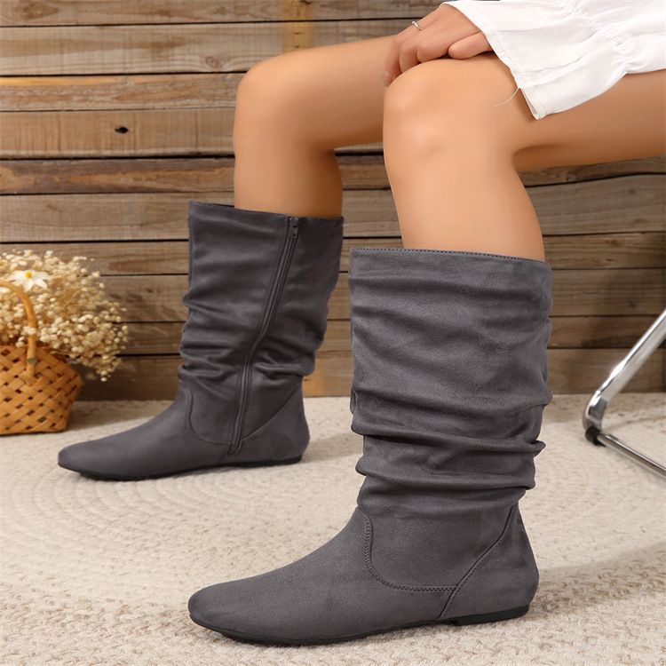 Women's leather boots worn with jeans – side zip flat heel